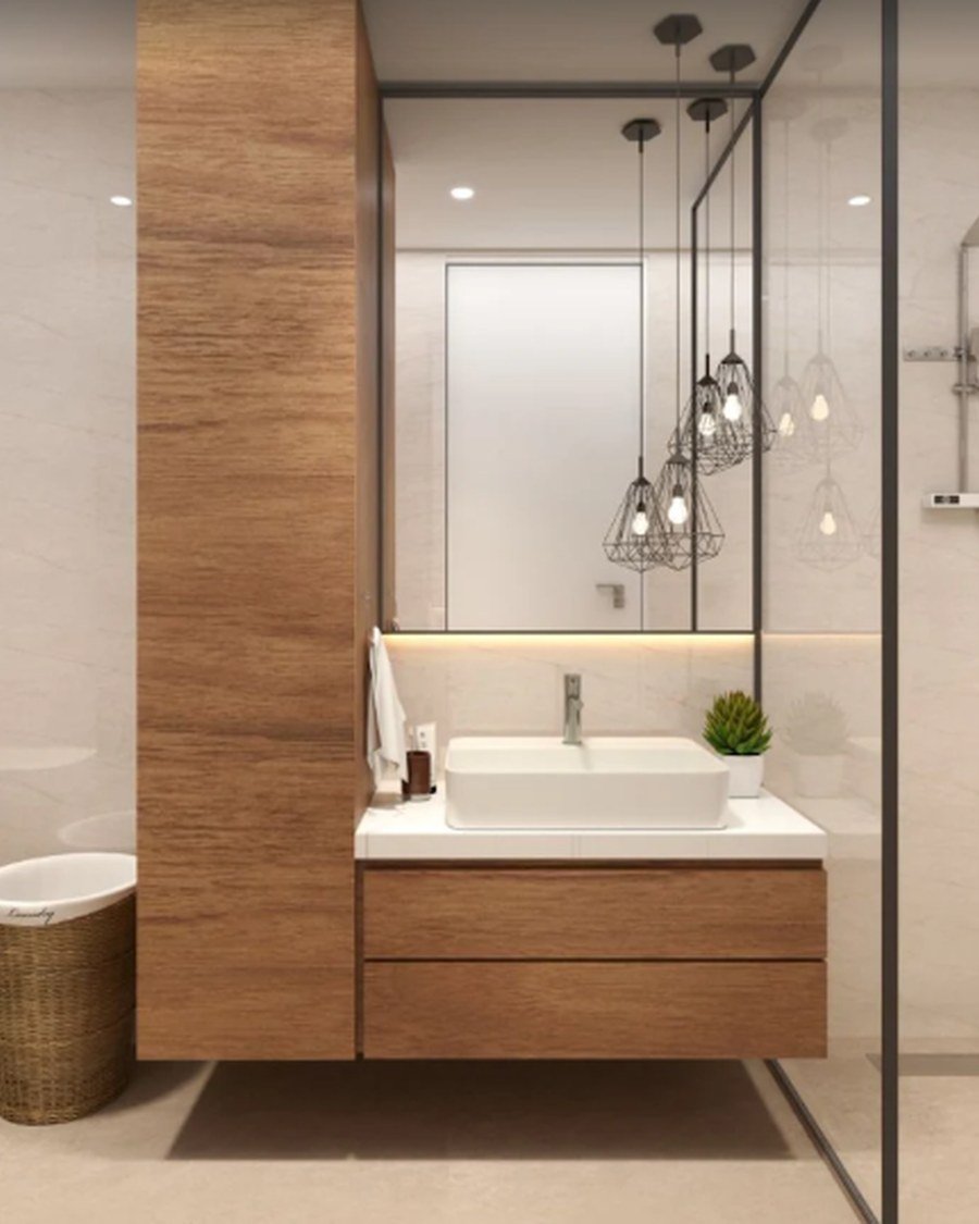 Bathroom with tall wood-veneer storage tower and glass walk-in shower
